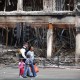 The police authorities and the insurance industry are disputing who may be potentially liable for costs stemming from the riots