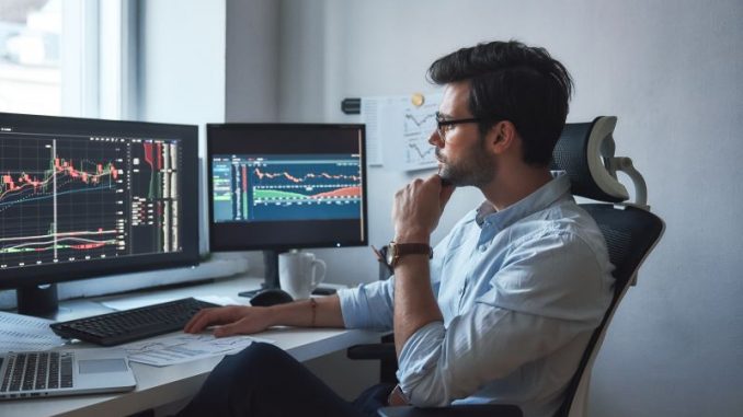 uk trader monitors market